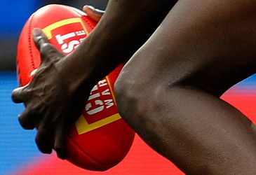 Which club does Sudanese refugee Aliir Aliir play for in the AFL?