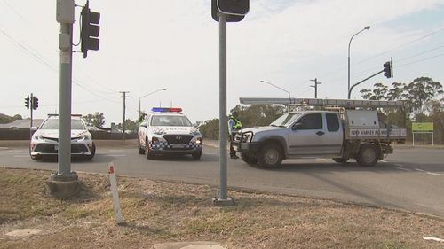 A murder investigation is underway after a man's body was found on a road in Rockhampton.