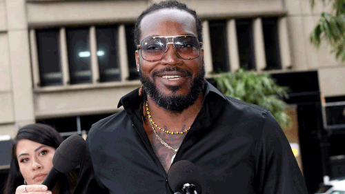 Chris Gayle arrives to the NSW Supreme Court today. Gayle alleges Fairfax Media wrongly suggested he had exposed himself to a woman. (AAP)