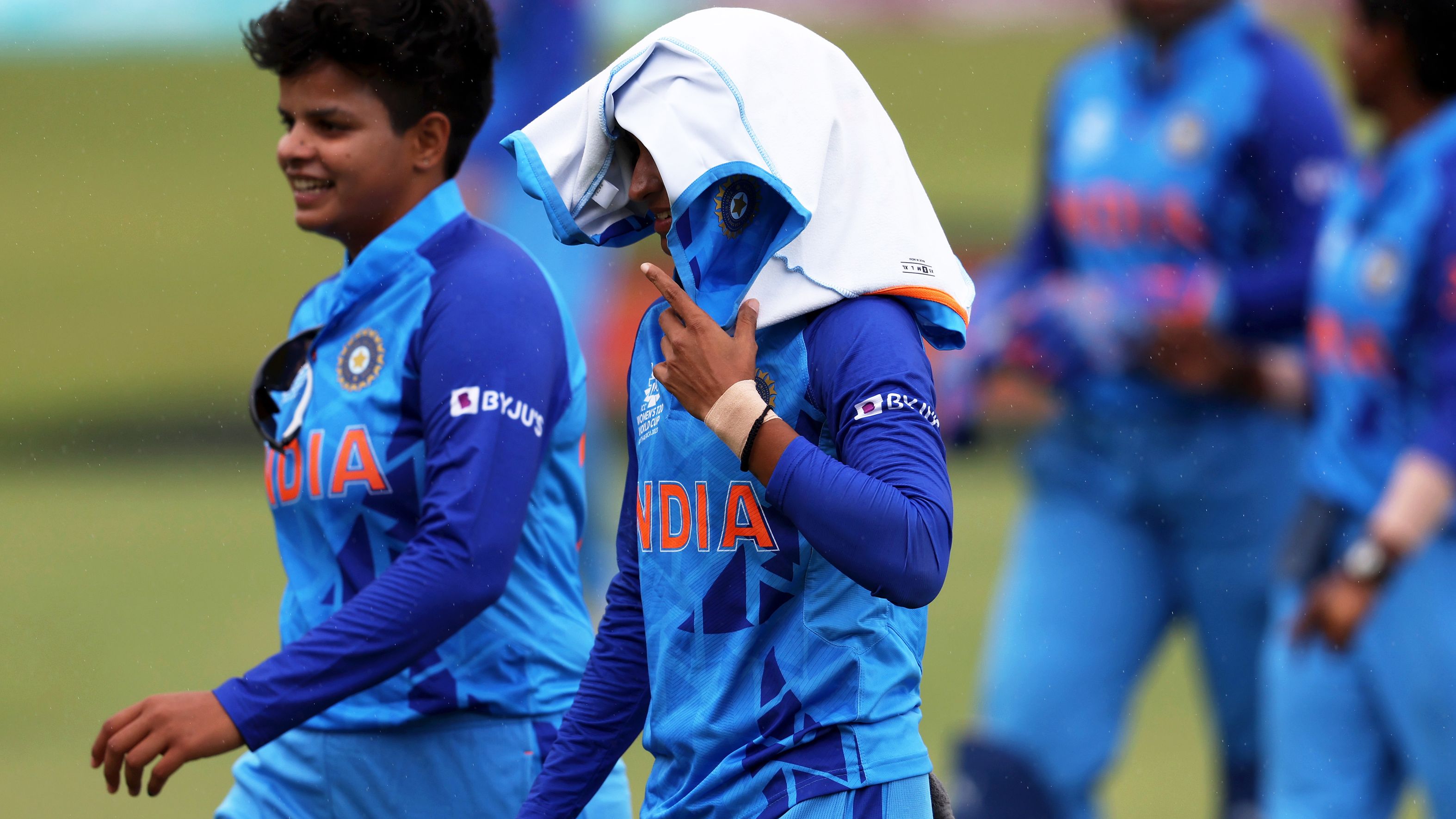 Harmanpreet Kaur leaves the field as rain delays play during the ICC Women's T20 World Cup group B match between India and Ireland.
