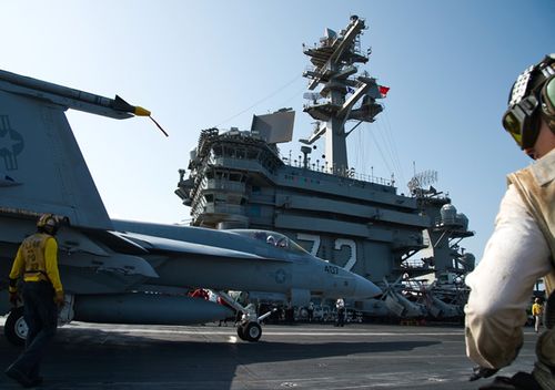 An F/A-18 fighter jet taxis on the deck of the USS Abraham Lincoln aircraft carrier in the Arabian Sea. US President Donald Trump last week called off air strikes on Iran, deciding instead to launch cyber attacks on Iranian targets.