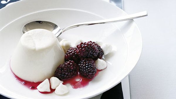 Almond milk panna cotta with macerated blackberries and almond meringues