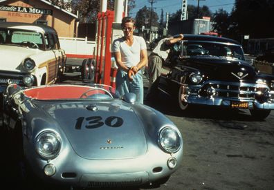 James Dean at a gas station with a silver Porsche 550 Spyder he named Little Bastard, just hours before the fatal crash.