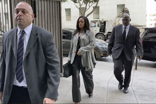 Singer Rihanna, center, returns to Clara Shortridge Foltz Criminal Justice Center in Los Angeles on Friday, Jan. 31, 2025. (AP Photo/Liam McEwan)