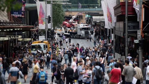 Trucks block traffic from entering Market Street in Sydney's CBD. (Image: AAP)