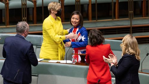 Dai Le is congratulated by colleagues after delivering her first speech in Parliament