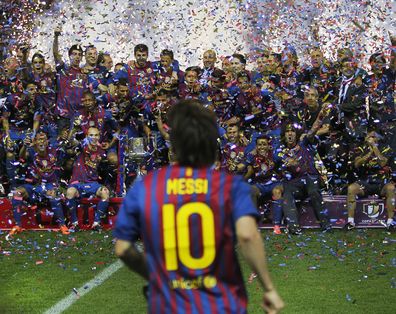 Lionel Messi celebrates Barcelona win