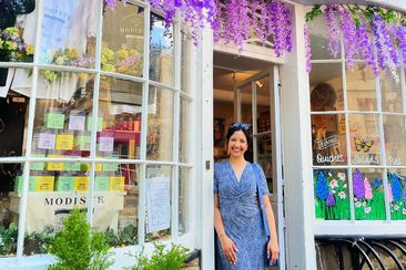 The exterior and interior of Abbey Deli in Bath is The Modiste shop in Bridgerton