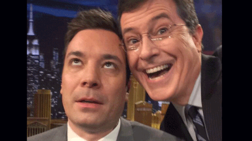 Friendly rivals: Jimmy Fallon (left) posing happily with fellow late-night TV host Stephen Colbert's selfie (Twitter). 