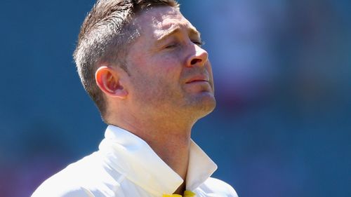 Australian cricket captain Michael Clarke watches on as the crowd pays tribute to Phillip Hughes ahead of the first Test against India. (Getty)
