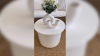 Woman turns old ottoman into on-trend side table with $20 Kmart hack