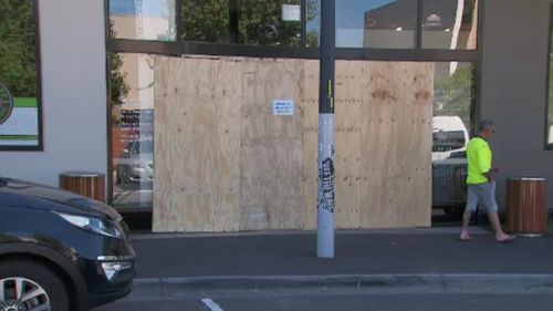 The store was boarded up in wake of the robbery. (9NEWS)