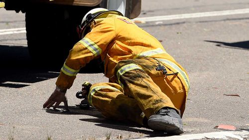 Tony Abbott falls fighting Sydney bushfire