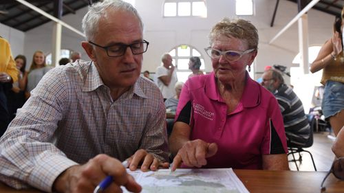 Mr Turnbull has said disaster relief funding from the Federal and state governments has now been authorised to help some of the reisdents he visited in the evacuation centres. Picture: AAP.