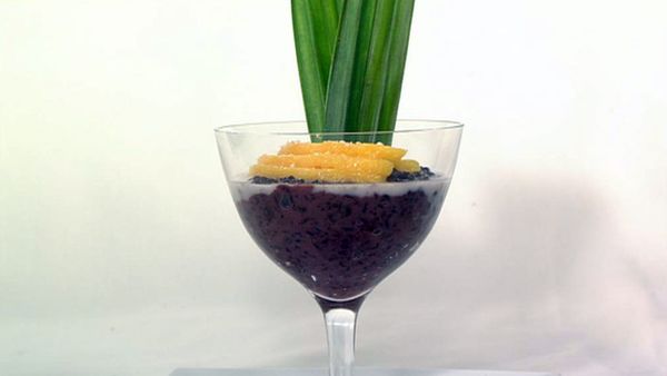 Black sticky rice with mangoes and sweet coconut sauce