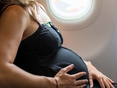 Pregnant woman on a flight