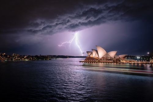 Multiple train services were delayed in the heavy rain, flights were cancelled and road traffic was backed up as the heavy rain dumped over suburbs.