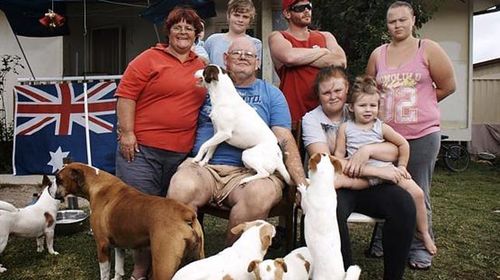 Ashley (centre) and Peta's (far left) family from Struggle Street. (SBS)