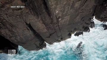 A group of adrenaline junkies in Western Australia walked along a 115 metre long line suspended about 70 metres above the ocean in West Cape Howe last weekend. 