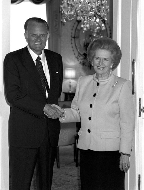 UK Prime Minister Margaret Thatcher with US evangelist Billy Graham. (AAP