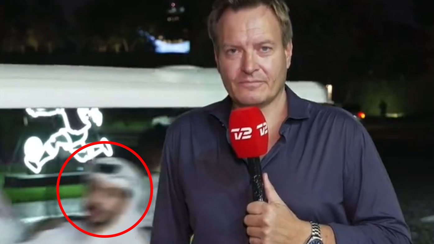 Danish TV reporter Rasmus Tantholdt is ambused during a live cross from the streets of Doha ahead of the FIFA World Cup