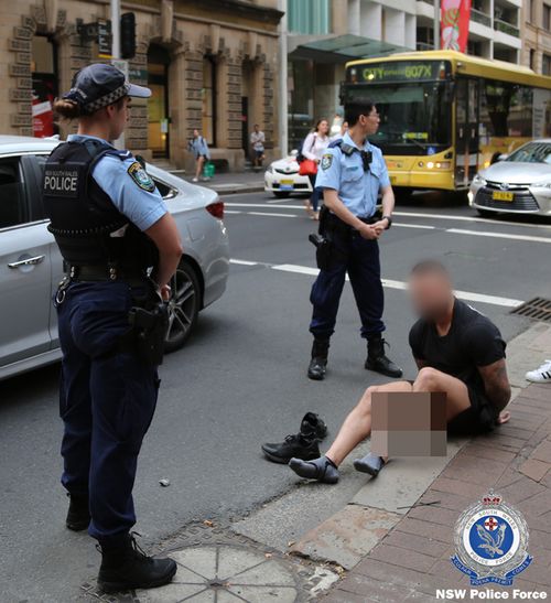 NSW Police arrest a man in the city's CBD.