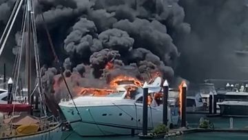 A super yacht has caught fire on Hamilton Island in the Whitsundays.Flames engulfed the luxury boat, with thick black smoke billowing into the air this morning.