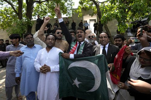 Lawyers and supporters of Pakistani imprisoned former Prime Minister Imran Khan react after court decision in Islamabad, Pakistan, Tuesday, August 29, 2023.  