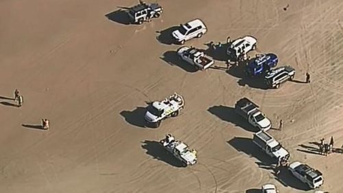 The scene at Teewah Beach on Queensland's Sunshine Coast after the two men drowned.