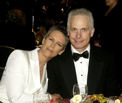 LOS ANGELES - FEBRUARY 21:  Actress Jamie Lee Curtis (L) and her husband Christopher Guest attend the 6th Annual Costume Guild Awards reception at the Beverly Hilton Hotel February 21, 2004 in Beverly Hills, California.  (Photo by Carlo Allegri/Getty Images)