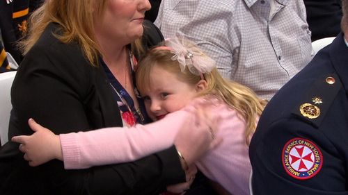Georgia Ritter hugged her mother before walking onstage to pick up her award. (9NEWS)