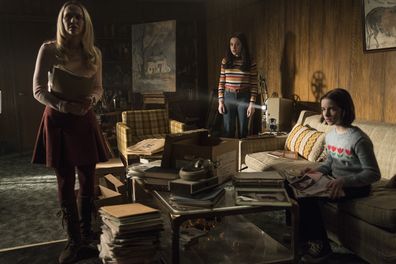 (L - R) Madison Iseman, Katie Sarife and Mckenna Grace in a scene from Annabelle Comes Home.