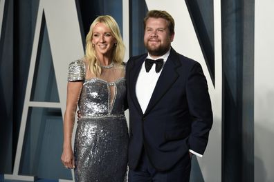 Julia Carey, left, and James Corden arrive at the Vanity Fair Oscar Party on Sunday, March 27, 2022, at the Wallis Annenberg Center for the Performing Arts in Beverly Hills, California