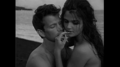 Helena Christensen with singer Chris Isaak in the music video for ' Wicked Game' 1990