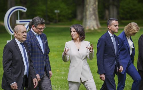 (L-R) Jean-Yves Le Drian, Foreign Minister of France, Dmytro Kuleba, Foreign Minister of Ukraine, Annalena Baerbock, Foreign Minister of Germany, Luigi Di Maio, Foreign Minister of Italy, and Elizabeth Truss, Foreign Minister of the United Kingdom, walk through the garden in front of Weissenhaus Castle during the G7 Group of leading democratic economic powers at the Weissenhaus resort in Weissenhaeuser Strand, Germany, Friday, May 13, 2022. 