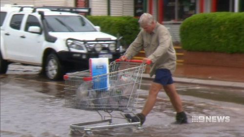 Broome residents stocked up on essential supplies before retreating to their homes. (9NEWS)