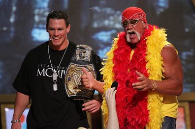 John Cena and Hulk Hogan onstage at the 2005 Teen Choice Awards held at Gibson Amphitheatre at Universal CityWalk on August 14, 2005 in Universal City, California.