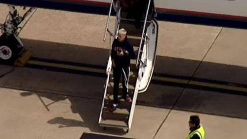 Bieber was seen using SnapChat as he disembarked the private jet. (9NEWS)