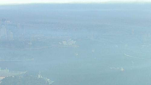 The Sydney Opera House could barely be seen through the haze of smoke. (9NEWS)