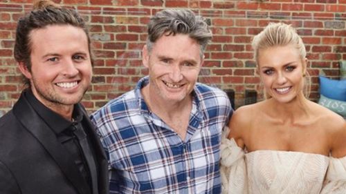 Elyse and Josh with comedian Dave Hughes who bought their home for $3m - to give them a handsome prize of half a million-plus.