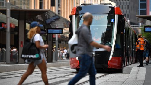 Sydney's light rail is seen along George Street in Sydney, Saturday, December 14, 2019