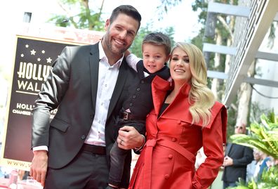 Carrie Underwood with husband Mike Fisher and son Isaiah at the ceremony honoring Carrie Underwood with star on the Hollywood Walk of Fame, September, 2018 