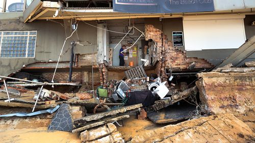 A man stands inside an area of The Beach Club. (AAP)