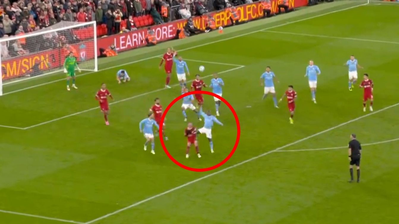 Jeremy Doku challenges Alexis Mac Allister in the box during Manchester City&#x27;s meeting with Liverpool.