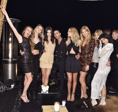 To celebrate 30 years on earth, Balmain’s creative director Olivier
Rousteing threw himself one helluva birthday bash at a private residence in
Laurel Canyon, Los Angeles. The guests (mostly supermodels and Kardashians)
enjoyed a performance by Tyga, drinks, dancing and a black and gold
Balmain-inspired birthday cake. Click through for your inside look.
