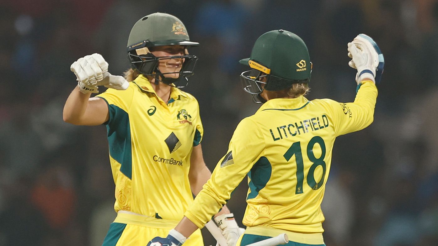 Ellyse Perry and Phoebe Litchfield of Australia celebrate their team&#x27;s win over India during game two of the women&#x27;s T20I series between India and Australia at DY Patil Stadium on January 7, 2024 in Navi Mumbai, India. (Photo by Pankaj Nangia/Getty Images)