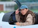 British-Belgian pilot Zara Rutherford, 19, poses before taking off for a round-the-world trip in a light aircraft, in bid to become the youngest to fly solo round-the-world in Wevelgem on August 18, 2021. - Rutherford will fly a Shark ultralight, the worlds fastest light sport aircraf during her circumnavigation, which is set to take her up to three months. - Belgium OUT (Photo by NICOLAS MAETERLINCK / BELGA / AFP) / Belgium OUT (Photo by NICOLAS MAETERLINCK/BELGA/AFP via Getty Images)