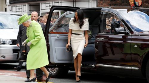 Meghan wasn't sure if she should get in the car ahead of the Queen, but the Queen quickly guided her through the correct protocol. Picture: Getty