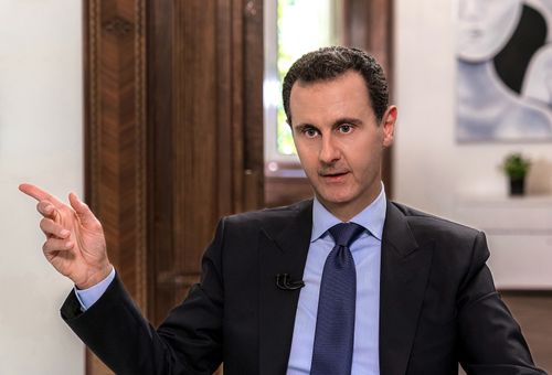 US President Donald Trump says he did not discuss assassinating Syrian leader Bashar al-Assad (pictured), disputing an account in a forthcoming book by journalist Bob Woodward