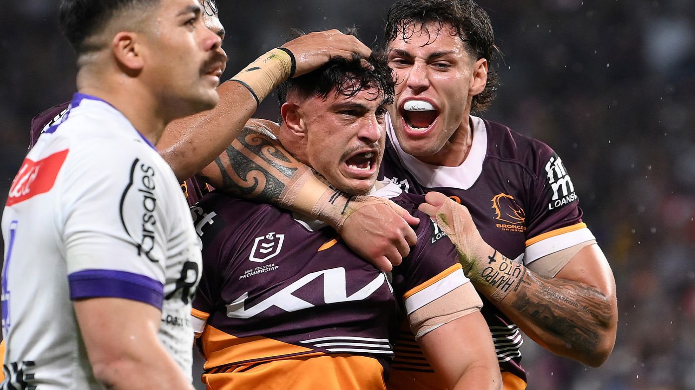 Kotoni Staggs celebrates a try for the Brisbane Broncos.